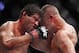 Oct 19, 2013; Houston, TX, USA; Gilbert Melendez (red gloves) fights against Diego Sanchez (blue gloves) in their lightweight bout during UFC 166 at Toyota Center. Mandatory Credit: Andrew Richardson-USA TODAY Sports