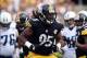 Sep 8, 2013; Pittsburgh, PA, USA; Pittsburgh Steelers linebacker Jarvis Jones (95) celebrates a tackle against the Tennessee Titans during the first half at Heinz Field. Mandatory Credit: Jason Bridge-USA TODAY Sports