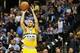 April 17, 2013; Denver, CO, USA; Denver Nuggets guard Evan Fournier (94) shoots the ball during the first half against the Phoenix Suns at the Pepsi Center. Mandatory Credit: Chris Humphreys-USA TODAY Sports