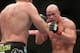 Jun 15, 2013; Winnipeg, MB, Canada; Ryan Jimmo (right) fights Igor Pokrajac during their light heavyweight bout at UFC 161 at MTS Centre. Mandatory Credit: Tom Szczerbowski-USA TODAY Sports