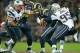 Oct 28,2012; London, UNITED KINGDOM; St. Louis Rams quarterback Sam Bradford (8) is pressured by New England Patriots defensive lineman Rob Ninkovich (50) and defensive end Chandler Jones (95) in the 2012 NFL International Series game at Wembley Stadium.