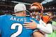 Bengals kicker Mike Nugent greets NFL great David Akers after beating Akers' Lions