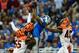 Oct 20, 2013; Detroit, MI, USA; Detroit Lions wide receiver Calvin Johnson (81) catches pass in the end zone while being defended by Cincinnati Bengals outside linebacker Vontaze Burfict (55), free safety Reggie Nelson (20) and strong safety George Iloka