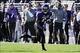 Oct 19, 2013; Evanston, IL, USA; Northwestern Wildcats running back Stephen Buckley (8) runs against the Minnesota Golden Gophers during the first quarter at Ryan Field. Mandatory Credit: David Banks-USA TODAY Sports