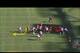 Reed sneaks through the traffic while the run fake distracts the defense.
