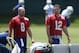 Jun 11, 2013; Indianapolis, IN, USA; Indianapolis Colts quarterback Andrew Luck (12) and backup quarterback Matt Hasselbeck (8) walk to another work station during minicamp at the Indianapolis Colts Training Facility. Mandatory Credit: Brian Spurlock-USA