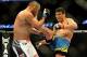 Feb 23, 2013; Anaheim, CA, USA; Dan Henderson (blue gloves) fights Lyoto Machida (red gloves) during their UFC welterweight bout at the Honda Center. Mandatory Credit: Jayne Kamin-Oncea-USA TODAY Sports