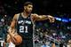 Oct 17, 2013; Atlanta, GA, USA; San Antonio Spurs power forward Tim Duncan (21) reacts to a call in the first half against the Atlanta Hawks at Philips Arena. Mandatory Credit: Daniel Shirey-USA TODAY Sports