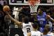 Oct 22, 2013; San Antonio, TX, USA; San Antonio Spurs forward Kawhi Leonard (2) drives to the basket under pressure from Orlando Magic forward Solomon Jones (22) during the first half at AT&T Center. Mandatory Credit: Soobum Im-USA TODAY Sports