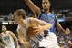 Oct 19, 2013; Greensboro, NC, USA; Charlotte Bobcats forward Cody Zeller (40) dribbles the ball past Dallas Mavericks center Fab Melo (14) during the game at Greensboro Coliseum. The Mavericks won 89-83. Mandatory Credit: Sam Sharpe-USA TODAY Sports