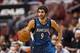 Oct 23, 2013; Philadelphia, PA, USA; Minnesota Timberwolves guard Ricky Rubio (9) brings the ball up court during the second quarter against the Philadelphia 76ers at Wells Fargo Center. Mandatory Credit: Howard Smith-USA TODAY Sports