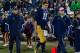 Oct 19, 2013; South Bend, IN, USA; Notre Dame Fighting Irish quarterback Tommy Rees (11) leaves the field after being injured in the third quarter against the USC Trojans at Notre Dame Stadium. Notre Dame won 14-10. Mandatory Credit: Matt Cashore-USA TODA