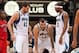 Oct 12, 2013; Minneapolis, MN, USA; Minnesota Timberwolves power forward Kevin Love (42) and small forward Corey Brewer (13) assist center Nikola Pekovic (14) who was knocked to the floor during the third quarter against the Toronto Raptors at Target Cent