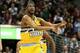 Apr 6, 2013; Denver, CO, USA; Denver Nuggets small forward Corey Brewer (13) reacts to a play in the second quarter against the Houston Rockets at the Pepsi Center. Mandatory Credit: Isaiah J. Downing-USA TODAY Sports