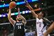 April 10, 2013; Los Angeles, CA, USA; Minnesota Timberwolves center Nikola Pekovic (14) shoots a basket against the defense of Los Angeles Clippers center DeAndre Jordan (6) during the first half at Staples Center. Mandatory Credit: Gary A. Vasquez-USA TO