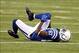 Oct 20, 2013; Indianapolis, IN, USA; Indianapolis Colts wide receiver Reggie Wayne (87) reacts after sustaining an injury against the Denver Broncos in the 2nd half during the game at Lucas Oil Stadium. Mandatory Credit: Brian Spurlock-USA TODAY Sports