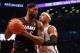 Oct 17, 2013; Brooklyn, NY, USA; Brooklyn Nets small forward Paul Pierce (34) holds off Miami Heat small forward LeBron James (6) during the first quarter at Barclays Center. Mandatory Credit: Anthony Gruppuso-USA TODAY Sports