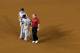 Rafael Furcal walks off the field after tearing a ligament in his right elbow against the Nationals on August 30, 2012.