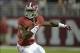 Oct 19, 2013; Tuscaloosa, AL, USA; Alabama Crimson Tide running back T.J. Yeldon (4) carries against the Arkansas Razorbacks during the first quarter at Bryant-Denny Stadium. Mandatory Credit: John David Mercer-USA TODAY Sports