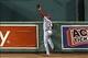 Oct 23, 2013; Boston, MA, USA; St. Louis Cardinals right fielder Carlos Beltran (3) takes away a grand slam from Boston Red Sox designated hitter David Ortiz (not pictured) during the second inning during game one of the MLB baseball World Series at Fenwa