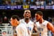 Feb 23, 2013; Chapel Hill, NC, USA; North Carolina Tar Heels guard Marcus Paige (5) reacts with P.J. Hairston (15) and Leslie McDonald (2) after making a shot in the second half. The Tar Heels defeated the Wolfpack 76-65 as the Dean E. Smith Center. Manda