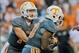 Oct 5, 2013; Knoxville, TN, USA; Tennessee Volunteers quarterback Justin Worley (14) hands off to Tennessee running back Rajion Neal (20) against the Georgia Bulldogs during the second half at Neyland Stadium. Georgia won 34-31 in overtime. Mandatory Cred