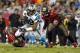 Oct 24, 2013; Tampa, FL, USA; Carolina Panthers wide receiver Steve Smith (89) runs with the ball as Tampa Bay Buccaneers defensive back Michael Adams (21) and outside linebacker Lavonte David (54) defend during the first quarter at Raymond James Stadium.