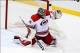 Oct 24, 2013; Saint Paul, MN, USA; Carolina Hurricanes goalie Justin Peters (35) makes a save during the third period against the Minnesota Wild at Xcel Energy Center. The Wild defeated the Hurricanes 3-1. Mandatory Credit: Brace Hemmelgarn-USA TODAY Spor