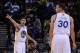 October 24, 2013; Oakland, CA, USA; Golden State Warriors shooting guard Seth Curry (3) signals as point guard Stephen Curry (30) looks on during the fourth quarter against the Portland Trail Blazers at Oracle Arena. The Trail Blazers defeated the Warrior