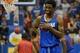 Oct 4, 2013; Lawrence, KS, USA; Kansas Jayhawks guard Andrew Wiggins (22) laughs with team mates after scoring during Late Night at Allen Fieldhouse. Mandatory Credit: Denny Medley-USA TODAY Sports