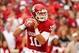 Oct 26, 2013; Norman, OK, USA; Oklahoma Sooners quarterback Blake Bell (10) looks for an open receiver during the first quarter against the Texas Tech Red Raiders at Gaylord Family - Oklahoma Memorial Stadium. Mandatory Credit: Alonzo Adams-USA TODAY Spo
