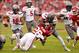 Oct 26, 2013; Norman, OK, USA; Texas Tech Red Raiders line backer Sam Eguavoen (13) tackles Oklahoma Sooners Damien Williams (26) during the first quarter at Gaylord Family - Oklahoma Memorial Stadium. Mandatory Credit: Alonzo Adams-USA TODAY Sports