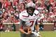 Oct 26, 2013; Norman, OK, USA; Texas Tech Red Raiders quarterback Davis Webb runs for the first down against the Oklahoma Sooners during the first quarter at Gaylord Family-Oklahoma Memorial Stadium. Mandatory Credit: Alonzo Adams-USA TODAY Sports