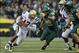 Oct 26, 2013; Eugene, OR, USA; UCLA Bruins quarterback Brett Hundley (17) runs the ball past Oregon Ducks linebacker Rodney Hardrick (48) at Autzen Stadium. Mandatory Credit: Scott Olmos-USA TODAY Sports