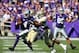 Oct 12, 2013; Manhattan, KS, USA; Kansas State Wildcats quarterback Daniel Sams (4) tries to break away from Baylor Bears safety Ahmad Dixon (6) during first-half action at Bill Snyder Family Stadium. Mandatory Credit: Scott Sewell-USA TODAY Sports