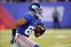 Oct 21, 2013; East Rutherford, NJ, USA; New York Giants wide receiver Rueben Randle (82) returns a punt against the Minnesota Vikings during the second half at MetLife Stadium. The Giants won the game 23-7. Mandatory Credit: Joe Camporeale-USA TODAY Sport