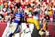 Aug 24, 2013; Landover, MD, USA; Washington Redskins tight end Fred Davis (83) catches a pass over Buffalo Bills safety Da'Norris Searcy (25) at FedEx Field. Mandatory Credit: Evan Habeeb-USA TODAY Sports