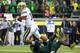 UCLA QB Brett Hundley was under pressure all night, whether he was dropping back or trying to run it.