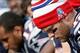 Oct 27, 2013; Foxborough, MA, USA; New England Patriots quarterback Tom Brady (12) hangs his head on the sidelines during the second quarter against the Miami Dolphins at Gillette Stadium. Mandatory Credit: Winslow Townson-USA TODAY Sports