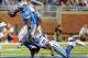 Oct 27, 2013; Detroit, MI, USA; Detroit Lions wide receiver Calvin Johnson (81) is tackled after the catch by Dallas Cowboys cornerback Brandon Carr (39) during 1st half of a game at Ford Field. Mandatory Credit: Mike Carter-USA TODAY Sports