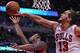 Oct 16, 2013; Chicago, IL, USA; Chicago Bulls center Joakim Noah (13) blocks the shot of Detroit Pistons shooting guard Kentavious Caldwell-Pope (5) during the second quarter at United Center. Mandatory Credit: Dennis Wierzbicki-USA TODAY Sports