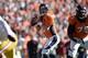 Oct 27, 2013; Denver, CO, USA; Denver Broncos quarterback Peyton Manning (18) prepares to pass in the first quarter against the Washington Redskins at Sports Authority Field at Mile High. Mandatory Credit: Ron Chenoy-USA TODAY Sports