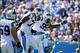 Sep 22, 2013; Charlotte, NC, USA; Carolina Panthers middle linebacker Luke Kuechly (59) and defensive ends Greg Hardy (76) and Charles Johnson (95) react after sacking New York Giants quarterback Eli Manning (10), not pictured, in the first quarter at Ban