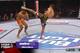 Machida throws a left high kick. Only Munoz's glove is in the way of the strike and it just isn't enough.