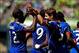 Drew Moor celebrates with his teammates after scoring at Seattle on July 20.