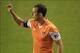 Oct 9, 2013; Houston, TX, USA; Houston Dynamo midfielder Brad Davis (11) signals a play on a corner kick against the Sporting KC during the first half at BBVA Compass Stadium. Mandatory Credit: Thomas Campbell-USA TODAY Sports
