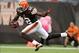 Oct 13, 2013; Cleveland, OH, USA; Cleveland Browns wide receiver Josh Gordon (12) makes a pass reception against the Detroit Lions during the second quarter at FirstEnergy Stadium. Mandatory Credit: Ron Schwane-USA TODAY Sports