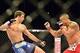 May 18, 2013; Jaragua do Sul, BRAZIL; Luke Rockhold (blue shorts) fights against Vitor Belfort (red shorts) during UFC on FX 8 at ARena Jaragua. Mandatory Credit: Jason da Silva-USA TODAY Sports