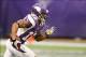 Oct 21, 2012; Minneapolis, MN, USA; Minnesota Vikings wide receiver Percy Harvin (12) returns a kickoff for a touchdown against the Arizona Cardinals to start the game but the play was called back on a penalty by the Vikings at the Metrodome. The Vikings