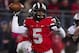 Oct 26, 2013; Columbus, OH, USA; Ohio State Buckeyes quarterback Braxton Miller (5) looks to pass the ball against the Penn State Nittany Lions at Ohio Stadium. Ohio State won 63-14. Mandatory Credit: Greg Bartram-USA TODAY Sports